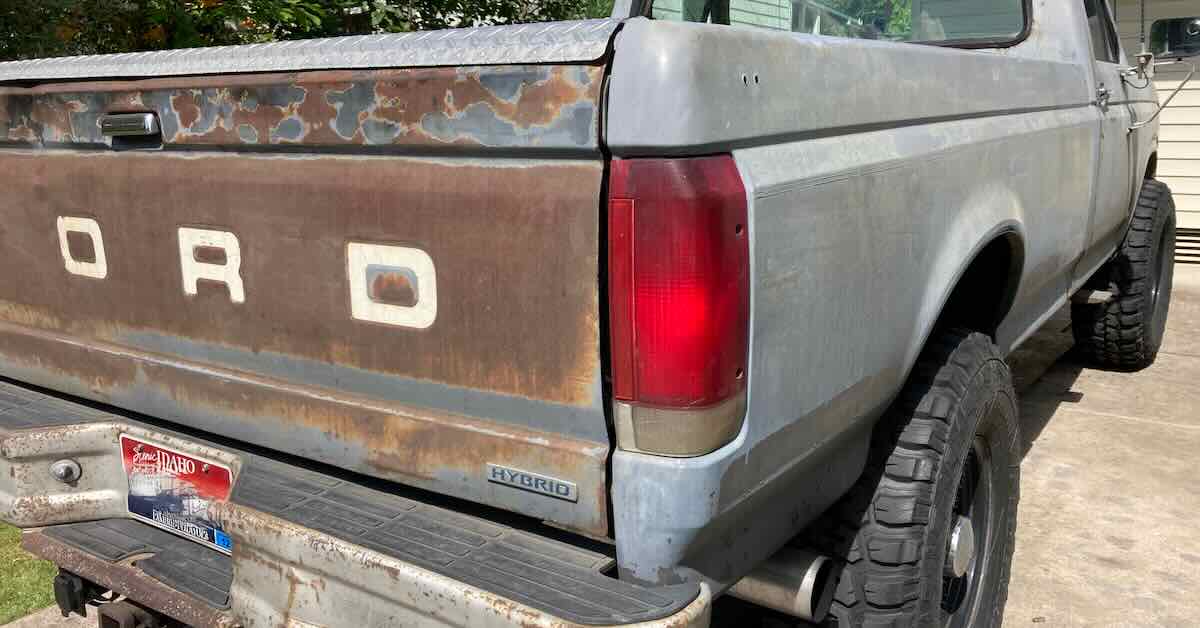 "Hybrid" erroneously/humorously misidentifying an old gas guzzling pickup.